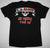 An 80's metal black t shirt with a L.A. Guns design on the front