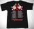 A black t shirt with rock band design on the front