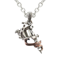 A silver colored pewter tattoo gun pendant with an antique scroll wrapped around it on a neck-chain.