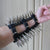 An 80's Metal 11 row large spike black leather arm gauntlet with buckle fastenings.