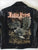 A metalworks leather jacket featuring Judas Priest 'Sad Wings Of Destiny' on the back, with epaulets, multiple pockets, adjustable belt and high quality zips.  