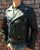 A metalworks leather jacket featuring Judas Priest 'Sad Wings Of Destiny' on the back, with epaulets, multiple pockets, adjustable belt and high quality zips.  