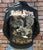 A metalworks leather jacket featuring Judas Priest 'Sad Wings Of Destiny' on the back, with epaulets, multiple pockets, adjustable belt and high quality zips.  