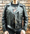 A metalworks leather jacket featuring Guns N Roses 'Los F'N Angeles' on the back, with epaulets, multiple pockets, adjustable belt and high quality zips.  