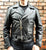 A metalworks leather jacket featuring Guns N Roses 'Los F'N Angeles' on the back, with epaulets, multiple pockets, adjustable belt and high quality zips.  