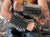 An 80's Metal 11 row large spike black leather arm gauntlet with buckle fastenings.